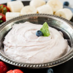 Looking for some spring recipes? We are going crazy for this blueberry fluff fruit dip and it only takes two ingredients, cream cheese and marshmallow creme! 