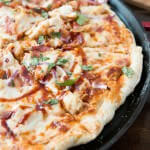 We love this copycat recipe!! Copycat California Pizza Kitchen BBQ Chicken Bacon Pizza ohsweetbasil.com