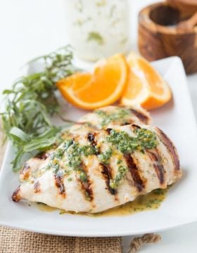 We make this grilled orange tarragon chicken all summer long! ohsweetbasil.com