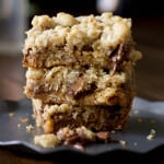 You will fall in love with these #Reeses Crumble bars. Buttery oatmeal cumble stuffed with chocolate chips and #Reesespeanutbuttercups ohsweetbasil.com_
