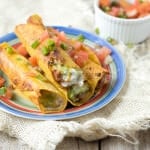 7layerdip taquitos are stuffed with beans, sour cream, guacamole, and cheese and then fried to perfection and served with fresh pico. #marchmadness ohsweetbasil.com-7