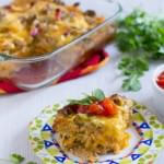 Mexican Breakfast enchiladas start with simple whole wheat tortillas layered with peppers, sausage, onions and egg ohsweetbasil.com