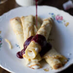 Marionberry Strawberry Syrup served over the most delicious cream filled crepes. #Breakfast at our house is amazing. ohsweetbasil.com_-3