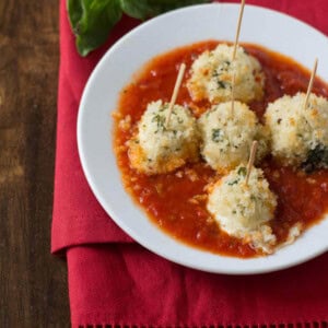Gooey Baked Mozarella that's been marinated and oh so flavorful!! Seriously so easy and your guests will be begging for more! #recipe ohsweetbasil.com_-3