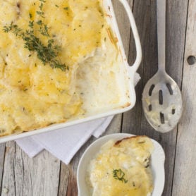 Scalloped Potatoes are one of our favorite Sunday dinner sides especially if guests are coming to dinner. #recipe ohsweetbasil.com-4