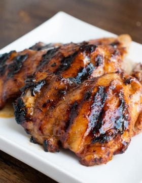 Oh my goodness, this chicken!! Sticky honey lime grilled chicken is our new favorite! ohsweetbasil.com