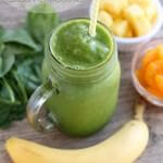 This Pineapple Orange Banana Green Smoothie is fruity and refreshing with chia seeds to add fiber and protein for additional nutrition! From Dessert Now Dinner Later for OhSweetBasil.com