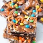 Holy yum! M&M Salted caramel pretzel bark and it only takes 3 minutes to make! ohsweetbasil.com