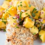 Our favorite way to enjoy mahi mahi with with this coconut marinade, macadamia crust and mango salsa! ohsweetbasil.com