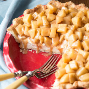 Apple cream pie with a few slices taken out