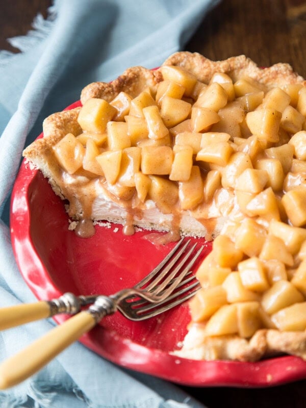 Apple cream pie with a few slices taken out