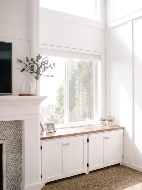White Mantle with Shiplap and built in cabinets