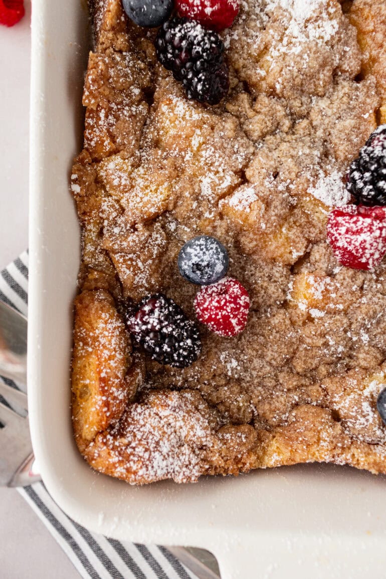 A photo taken on a casserole dish of Baked French Toast Casserole with Streusel on top