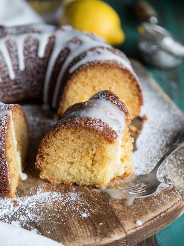 A slice of lemon bundt cake with glaze
