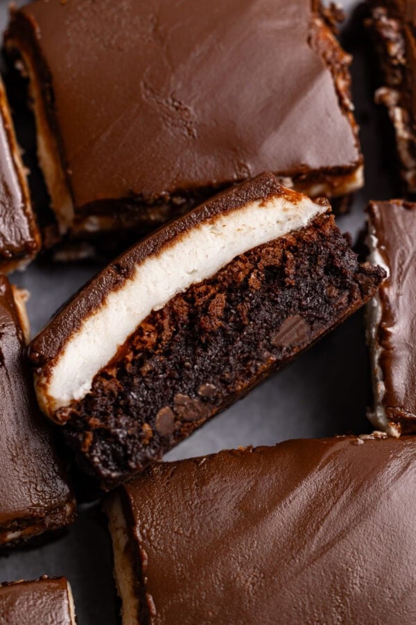 Rich chocolate brownie with a gooey center and smooth chocolate frosting. Perfect for dessert lovers and chocolate craving indulgence.