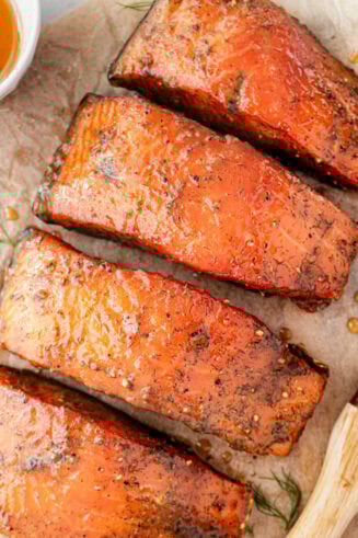 a photo of several salmon filets that have been smoked and seasoned