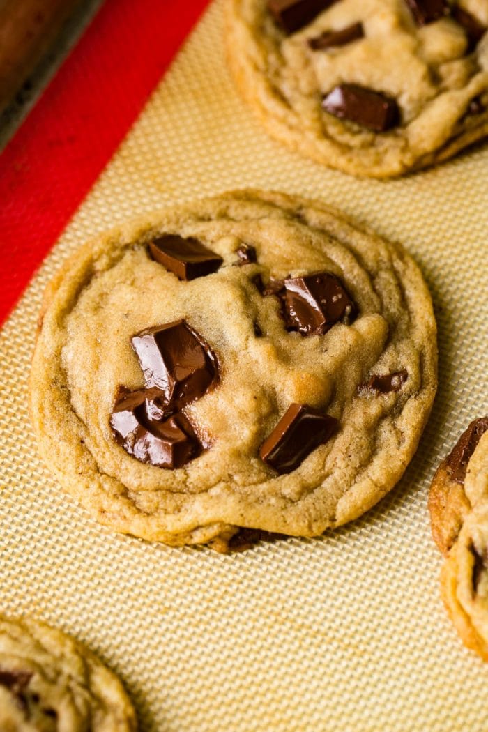 a perfectly baked brown butter chocolate chip cookie with melty chocolate chunks