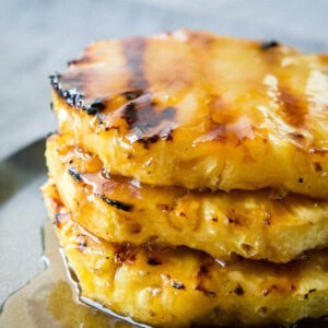 Juicy, sweet pineapple with a brown sugar butter sauce that's grilled to perfection. Looking for a healthier dessert? Try our brown sugar grilled pineapple! ohsweetbasil.com