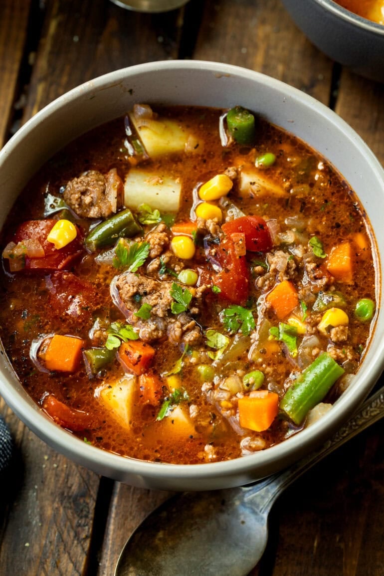 a bowl of savory ground beef and veggie soup
