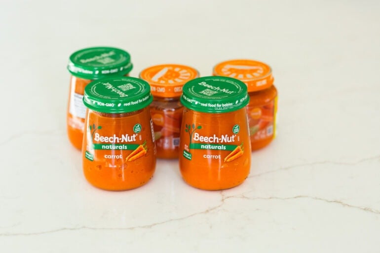 five jars of carrot baby food