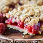 We love pie and crisps so when summer hit and everyone was posting their favorite backyard bbq desserts we had to do a cherry crisp bars mashup recipe. ohsweetbasil.com