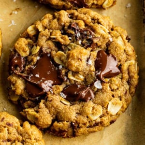 a thick and chewy pumpkin oatmeal cookie loaded with melty chocolate chunks