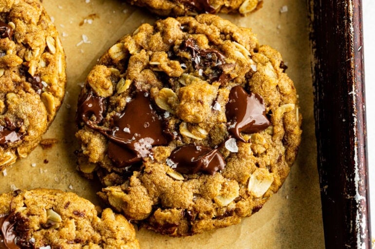 a thick and chewy pumpkin oatmeal cookie loaded with melty chocolate chunks
