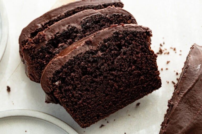 an overhead shot of pumpkin chocolate bread topped with a chocolate ganache 