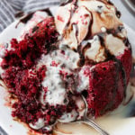 a red velvet cake filled with melted cookies and cream white chocolate candy bar