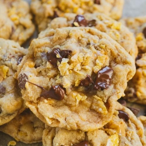 a stack of cowboy cookies with melty chocolate and peanut butter chips.
