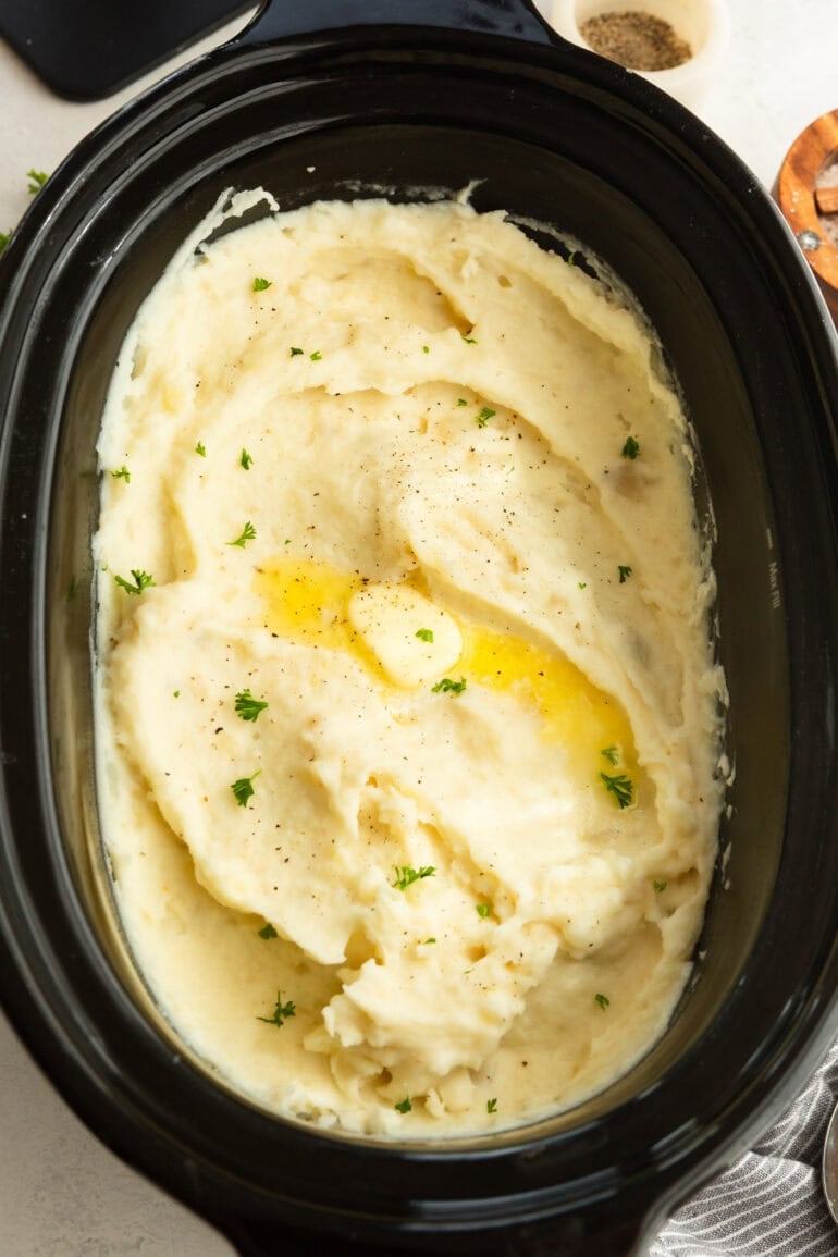 Homemade crockpot mashed potatoes served as a holiday side dish