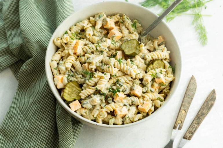 A creamy cold noodle dish with pickled cucumbers