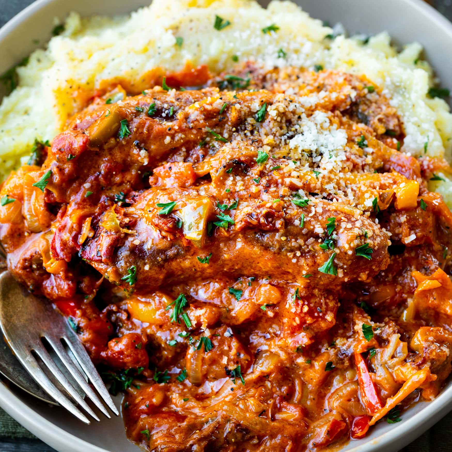 Creamy Sausage and Peppers over Mashed Potatoes
