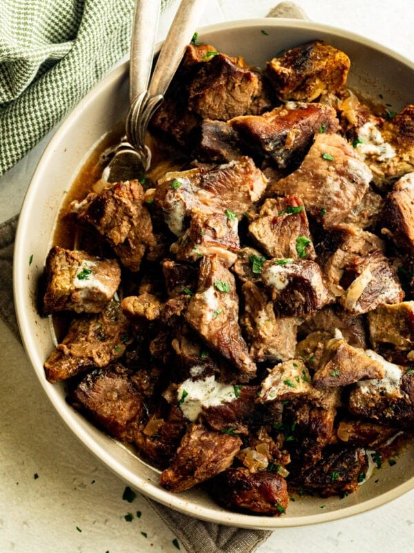 a large serving bowl of tender, fall apart steak bites
