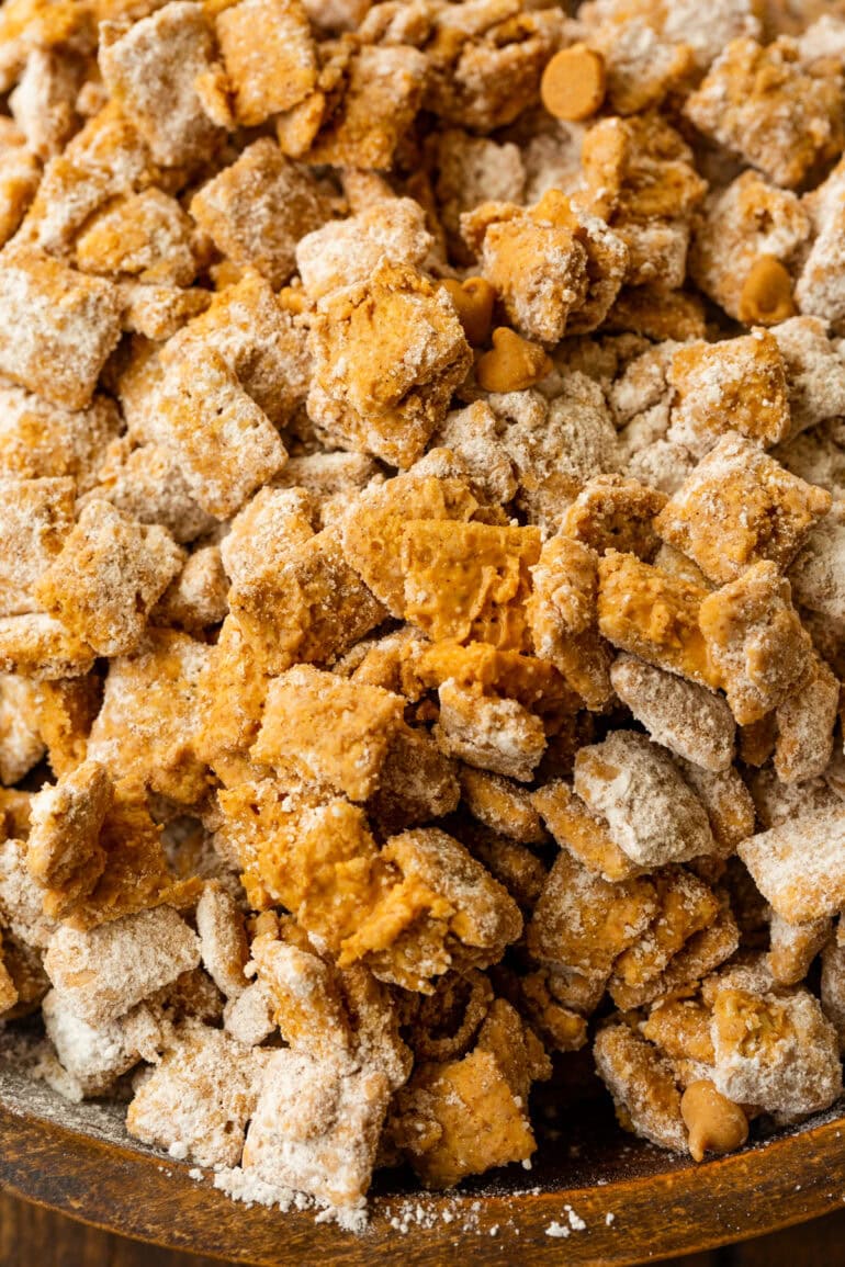 rice chex coated in peanut butter and melted peanut butter chips and tossed in powdered sugar