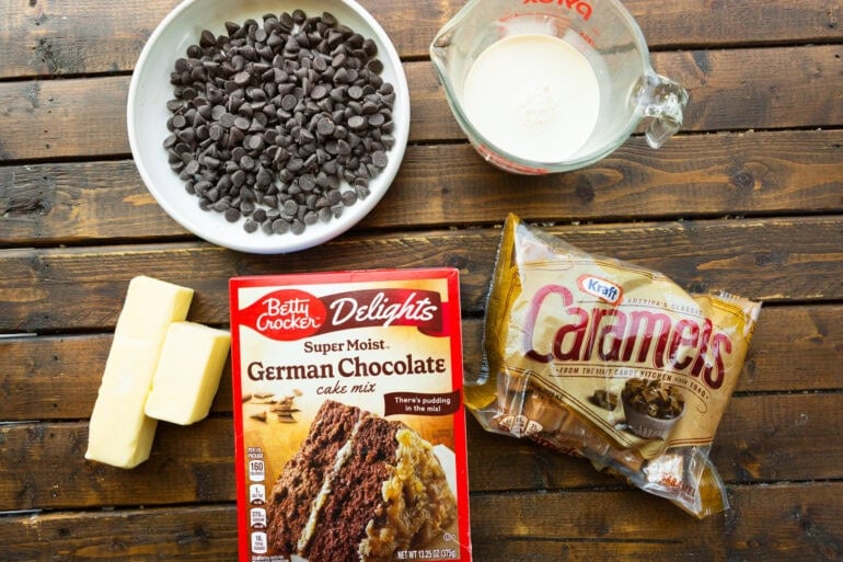 Ingredients for an easy dessert. Cake mix, buttery sweet candies, butter, chocolate chips, and cream!