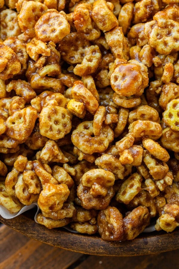 a photo of caramel coated honeycomb cereal tossed in cinnamon sugar
