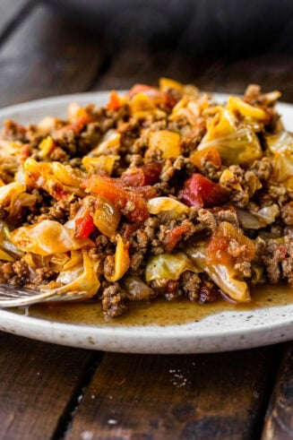 a photo of a plate full of juicy ground beef and cabbage