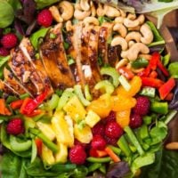 Our most favorite salad, teriyaki chicken salad!! It's so easy and perfect for all summer long! Juicy chicken, veggies, fruit and crunchy cashews! ohsweetbasil.com