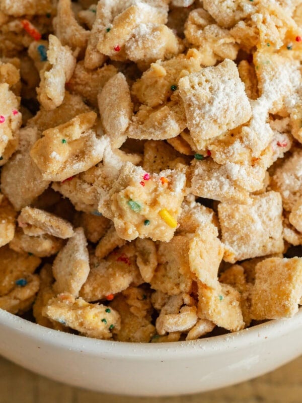 a large bowl of birthday cake muddy buddies