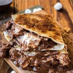 Want to know what the number one dessert of the summer is? It's not pie, it's grilled s'mores dessert quesadillas stuffed with nutella and marshmallows! ohsweetbasil.com