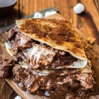 Want to know what the number one dessert of the summer is? It's not pie, it's grilled s'mores dessert quesadillas stuffed with nutella and marshmallows! ohsweetbasil.com