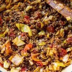 a photo of a plate full of juicy ground beef and cabbage