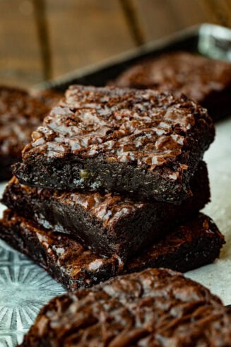 a photo of three chocolate brownies stacked on each other