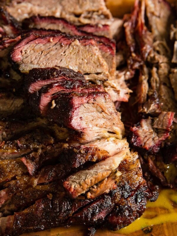 A photo of perfectly smoked beef brisket sliced and ready to devour.