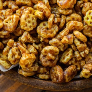 a photo of caramel coated honeycomb cereal tossed in cinnamon sugar