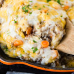 A creamy ground beef and rice casserole covered in gooey cheese all made in an Instant Pot! You'll love Instant Pot Cheesy Ground Beef and Rice Casserole!