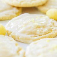 Soft and chewy lemon drop cookies are the perfect treat for those lemon lovers out there! A light glaze on top and a sprinkle of crushed lemon drops! ohsweetbasil.com