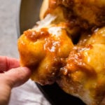 We have had this monkey bread my whole life! Just 4 ingredients and they are so soft and light. Seriously delicious! My mom's sticky buns are amazing!