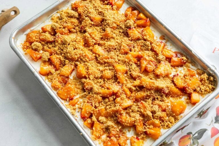 a full 9x13" baking dish full of peaches and cream dream bars